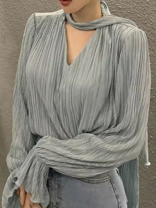 Celia - Blusa plisada elegante con lazo