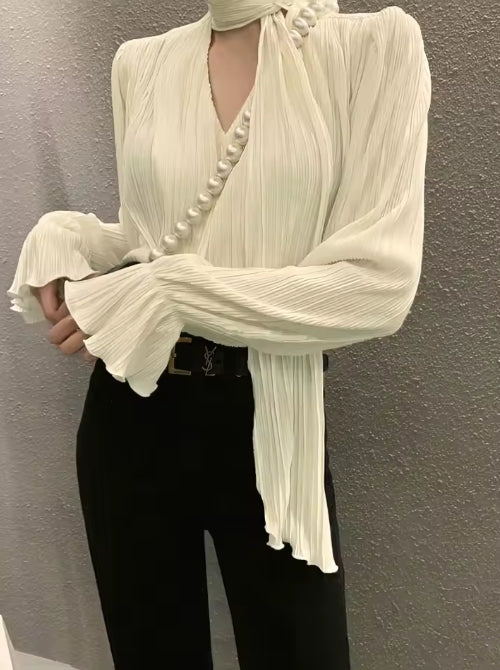 Celia - Blusa plisada elegante con lazo