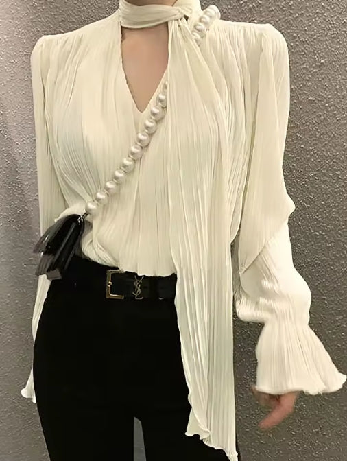 Celia - Blusa plisada elegante con lazo